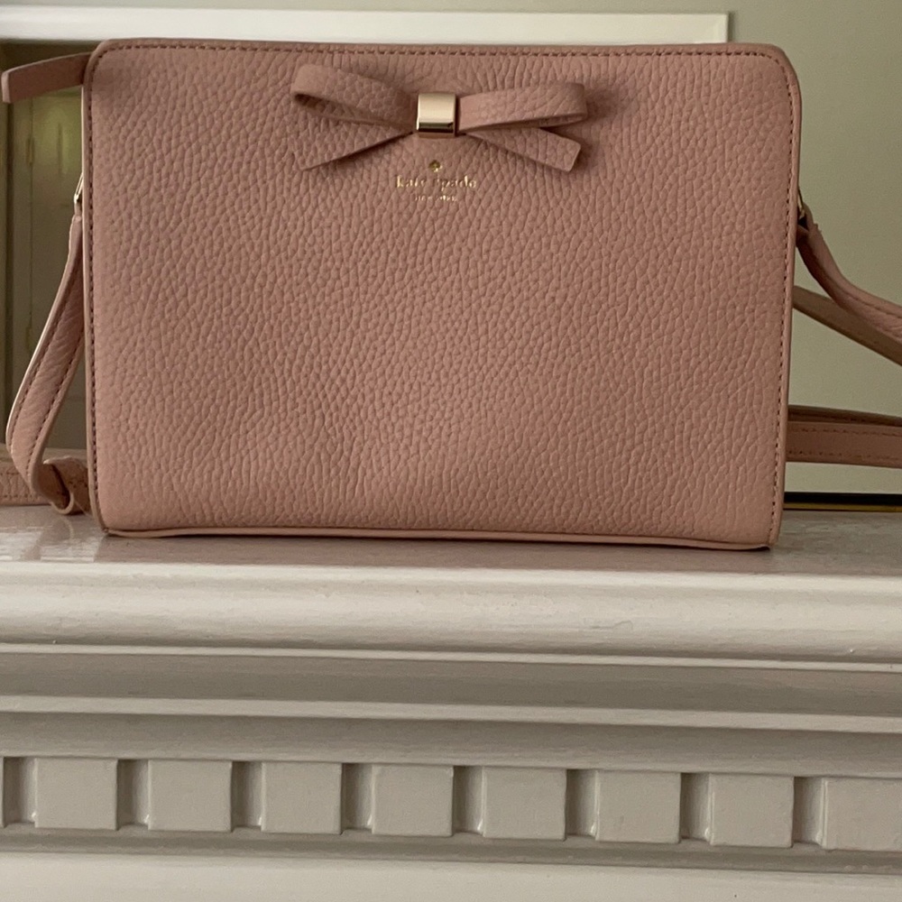 Soft pink Kate spade handbag.